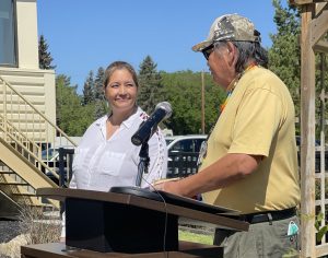 Jolene Fellhauer and Pat Buffalo at podium