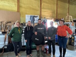 The winners of week three of AFSC Farmer Feed - north pose for a photo with AFSC team members