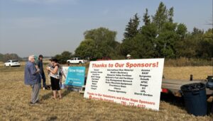 A sign thanking the sponsors of the Grow Hope and Fort Saskatchewan Foodgrains project. 