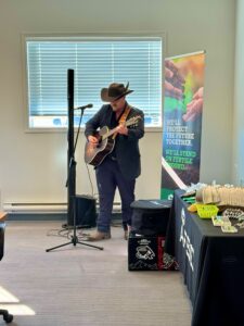 Jaydee Bixby performs during an AFSC Farmer Feed north harvest gathering.