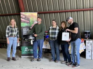 The winners of the final AFSC Farmer Feed south gathering of harvest 2024 pose with their prize pack.