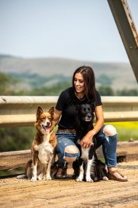 A woman with two dogs