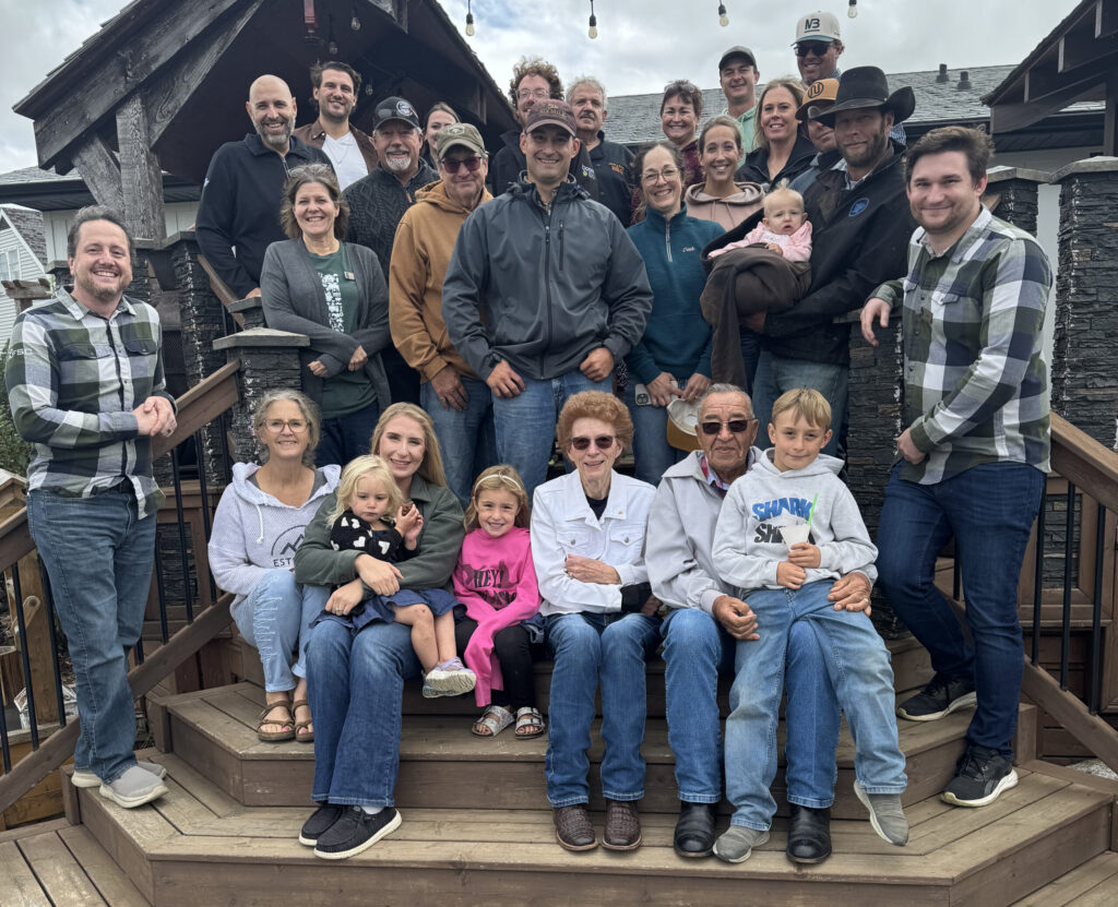 A group of people gathered on a set of stairs for a photo